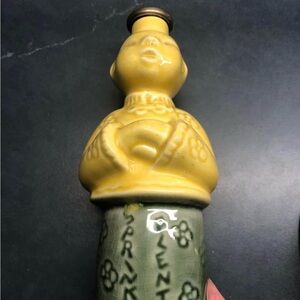 Vintage Yellow and Green Ceramic Figurine Bottle “sprinkle plenty”